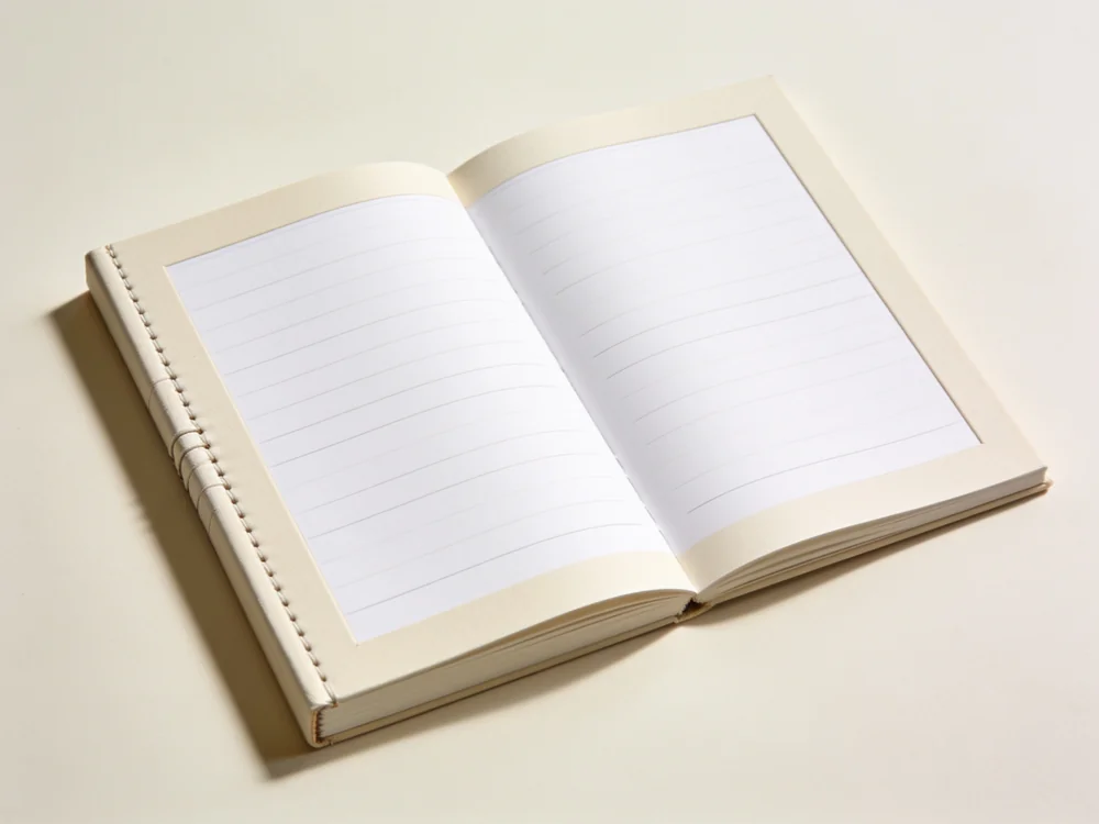 Left-bound legal notebook — White 80 gsm paper; sewn left spine; board cover
